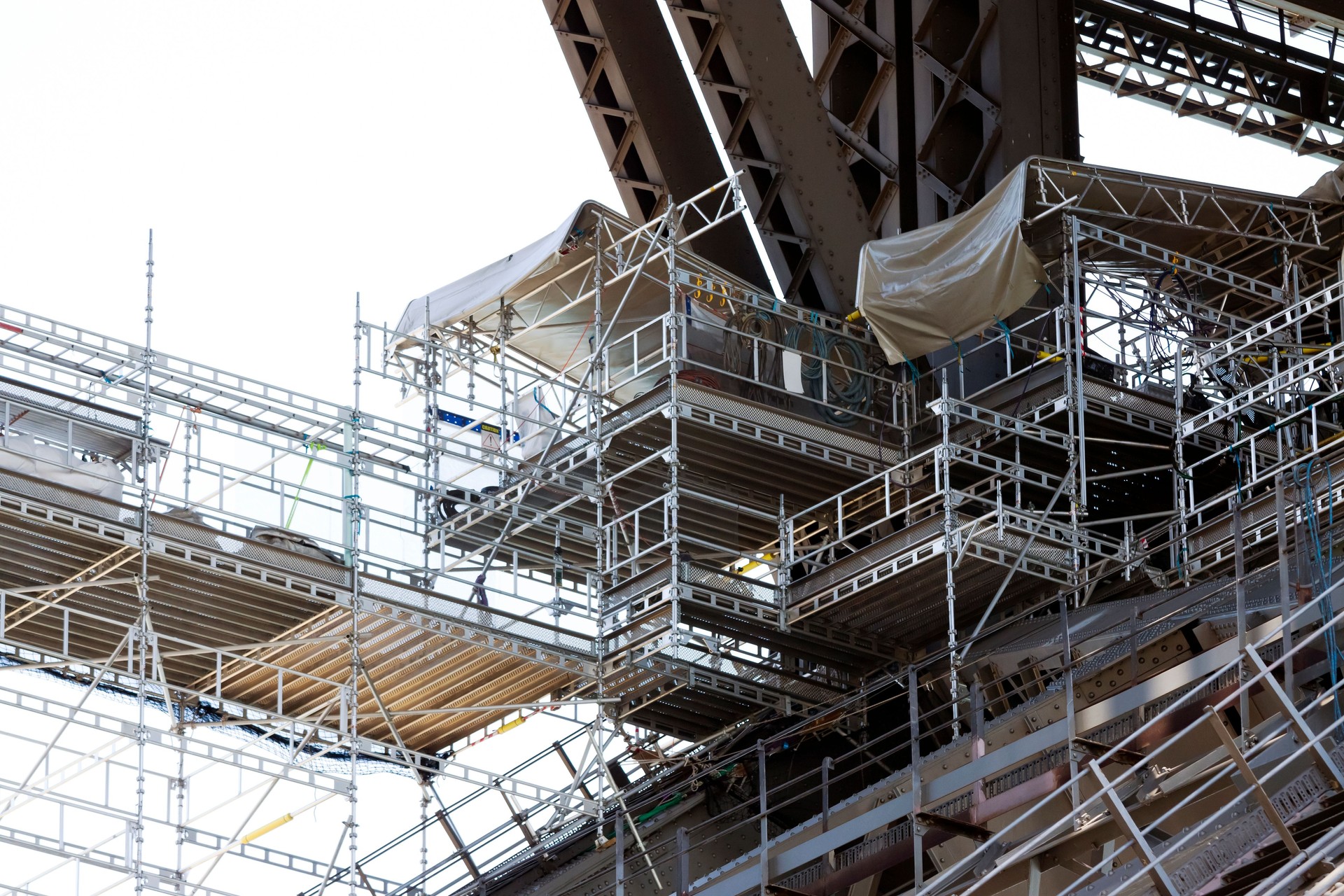 Scaffolding on Harbour bridge againts white background, copy space
